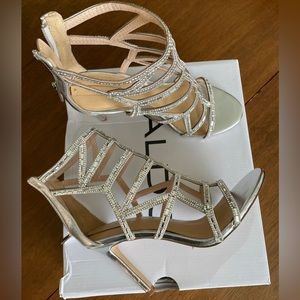 Aldo Norta caged heal in silver